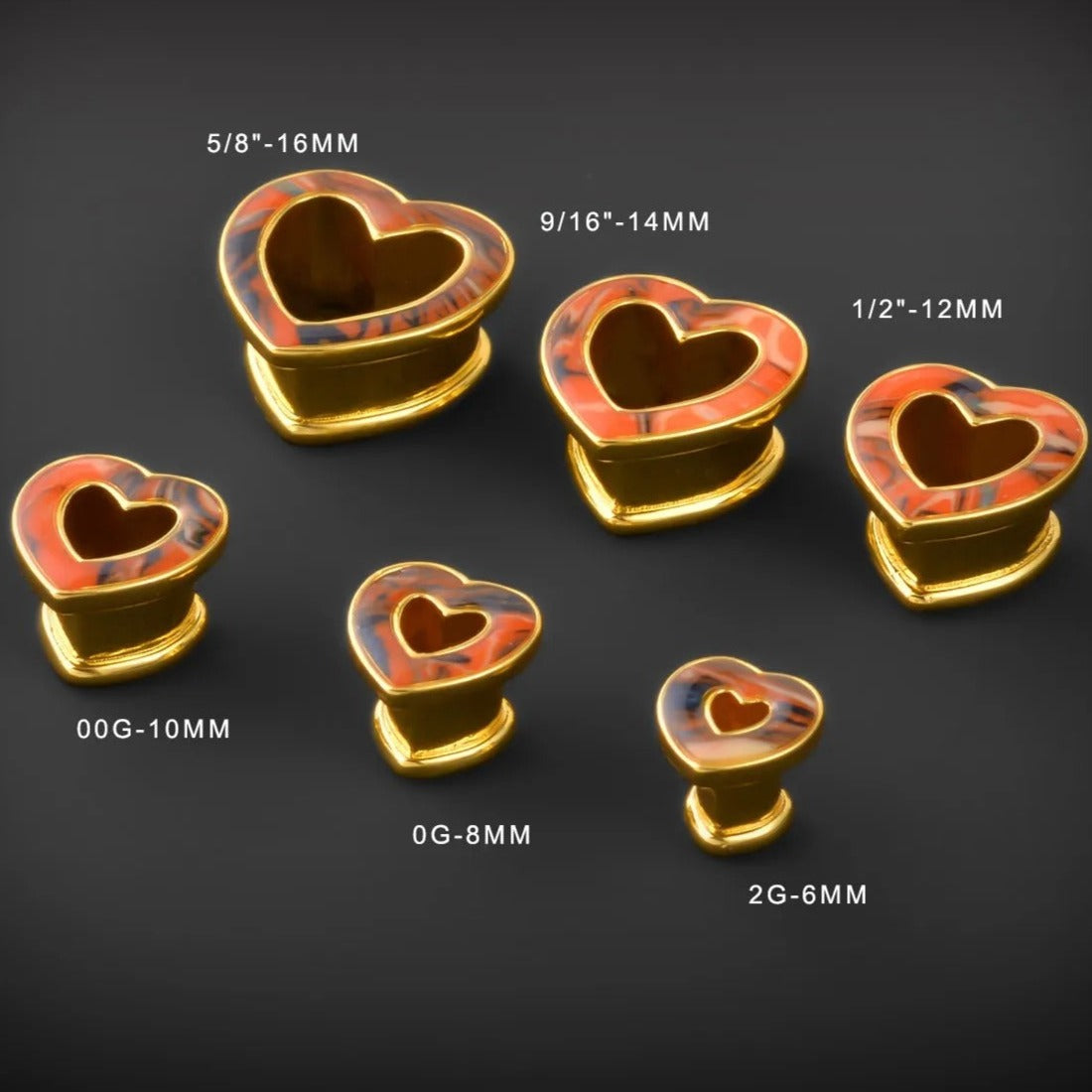 Hartvormige oorpluggen met gemarmerd ontwerp in gouden afwerking.