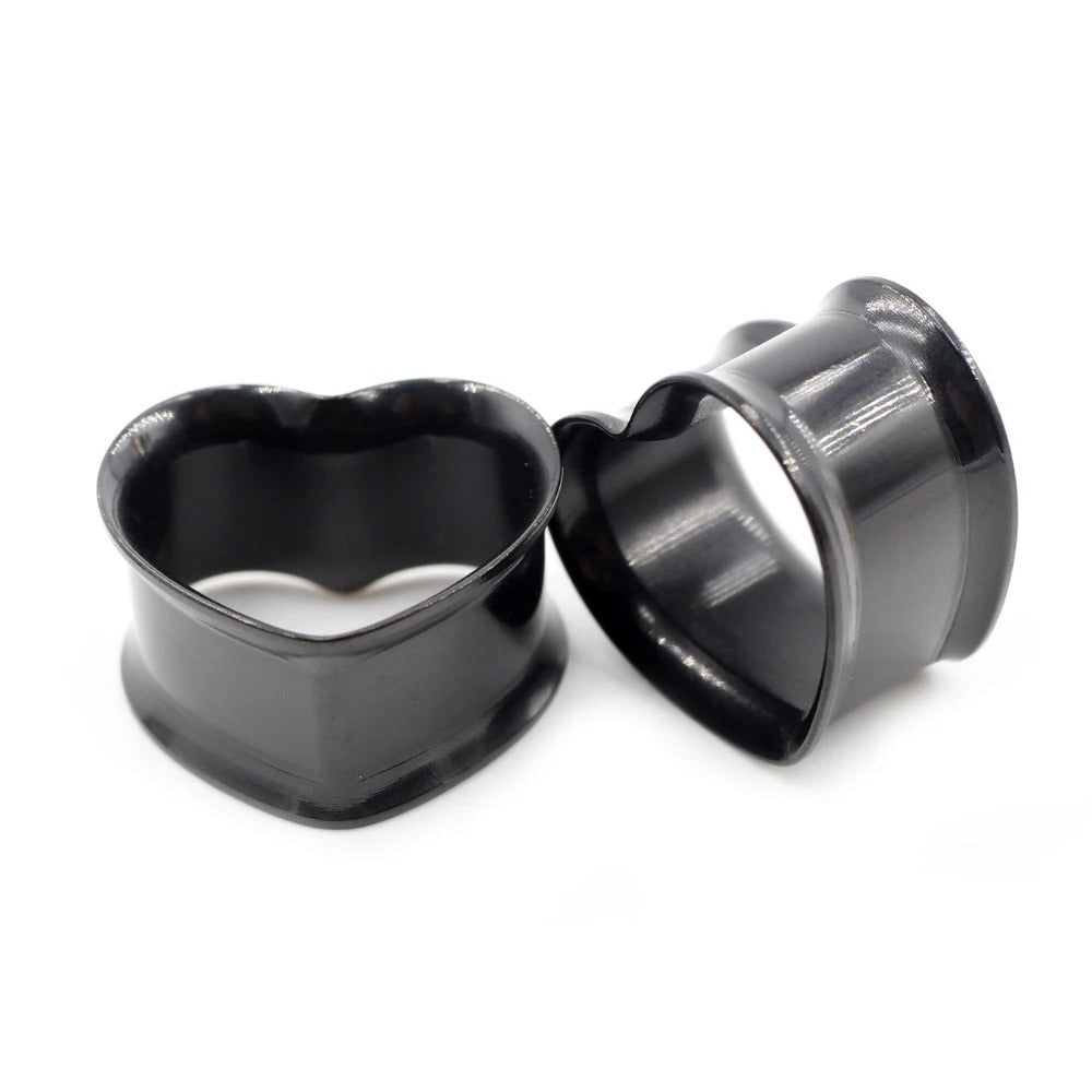 Zwarte hartvormige oortunnel, mysterie en passie voor je oren