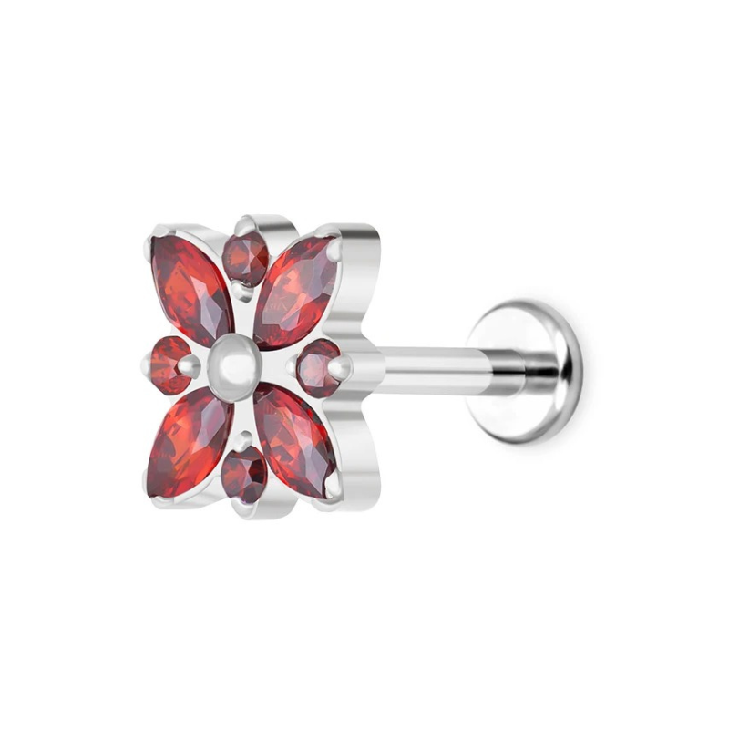 Oorstekker piercing, gotische bloemmotief in titanium met de schittering van zirkonia's.
