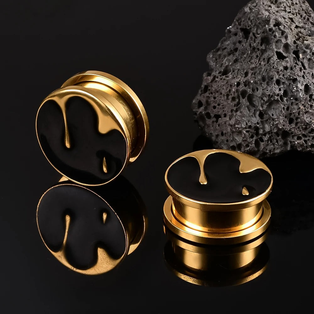 Smeltende druppel ontwerp voor zwarte en gouden concha spreider.