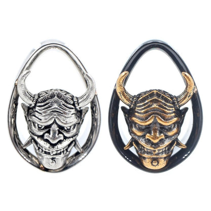 Zilveren Oni-ontwerp oorverbreder accessoire.