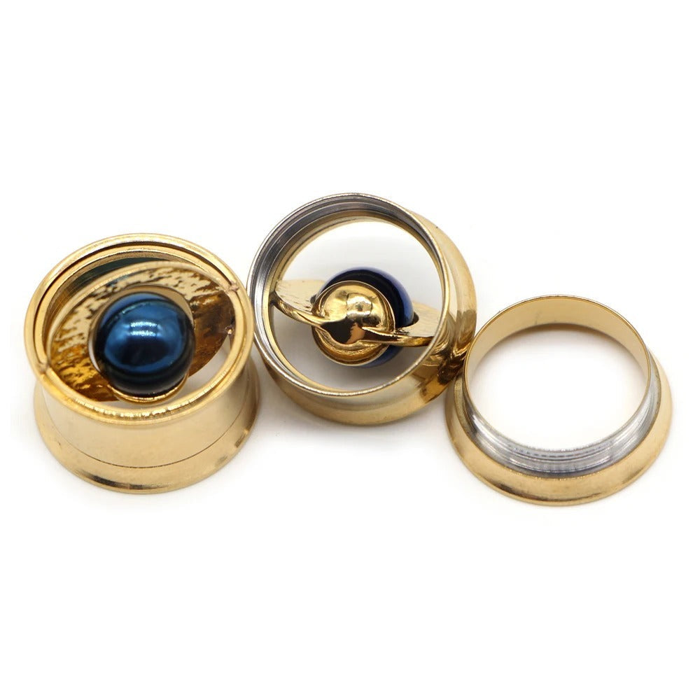 Metalen oorverbreder accessoire met steen.