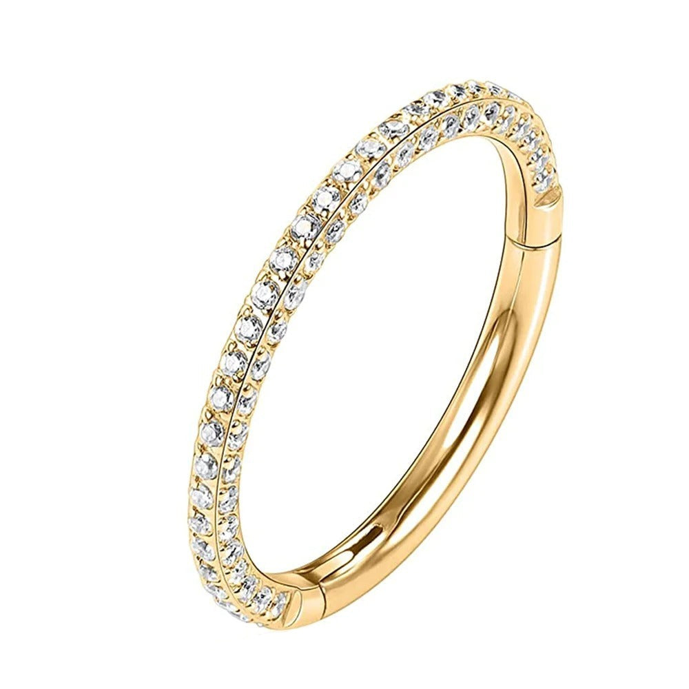 Gouden titanium oorring met zirkonia schitteringen voor een verfijnde look